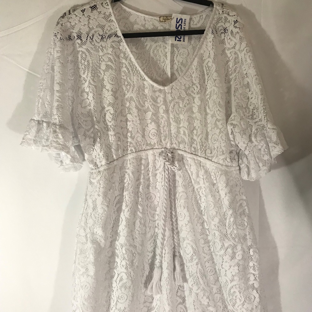 White swimsuit cover-up.